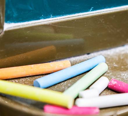 coloured chalks on a table