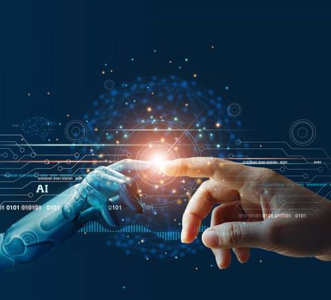 La imagen muestra la interacción entre un dedo humano y un dedo robótico, simbolizando la conexión entre la inteligencia artificial y la humanidad.