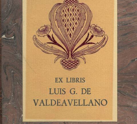 Un diseño de ex libris con un fondo marbled y un emblema en el centro que incluye el nombre Luis G. de Valdeavellano.