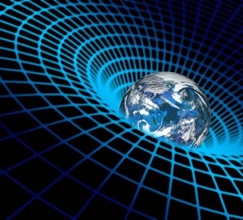 Una representación visual del fenómeno de la gravitación donde la Tierra se encuentra en un espacio deformado por la gravedad.