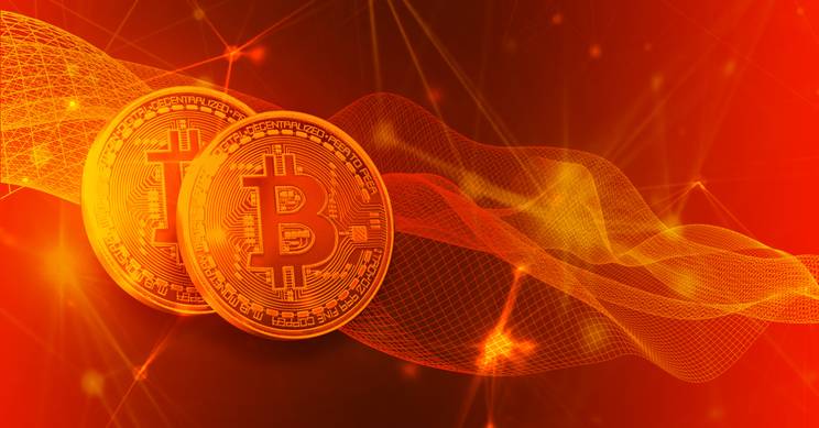 La imagen muestra dos monedas de Bitcoin sobre un fondo rojo con efectos de luz y ondas digitales.