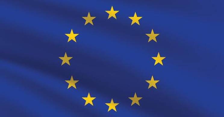 Bandera de la Unión Europea con fondo azul y estrellas doradas.