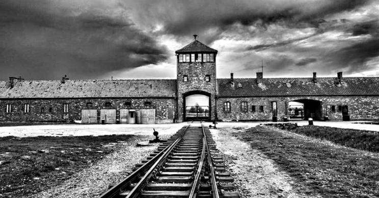 the-mother-of-evil-buildings-railroad-tracks-lead-into-v0-niyi7wuidgk71.webp