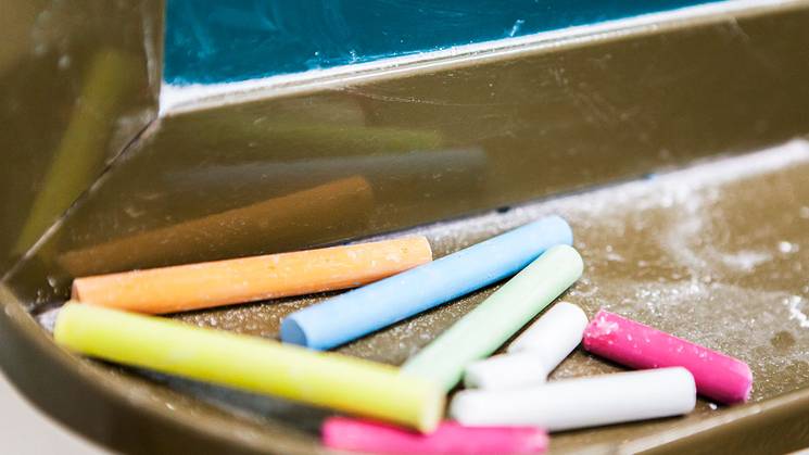 coloured chalks on a table