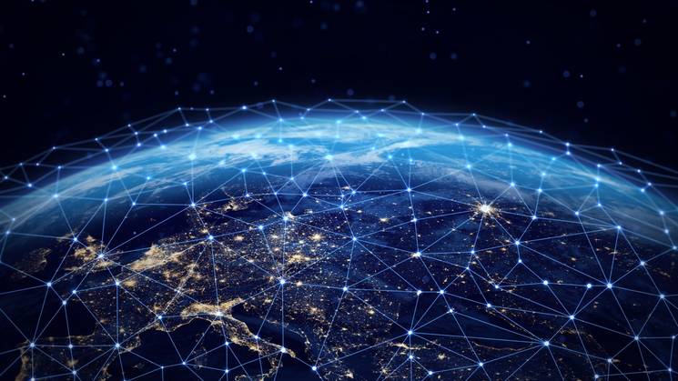 Una representación artística de la Tierra con una red de conexiones brillantes que simbolizan la tecnología y las comunicaciones.