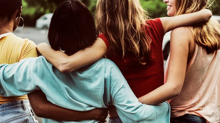 back-view-group-diverse-friends-walking-together